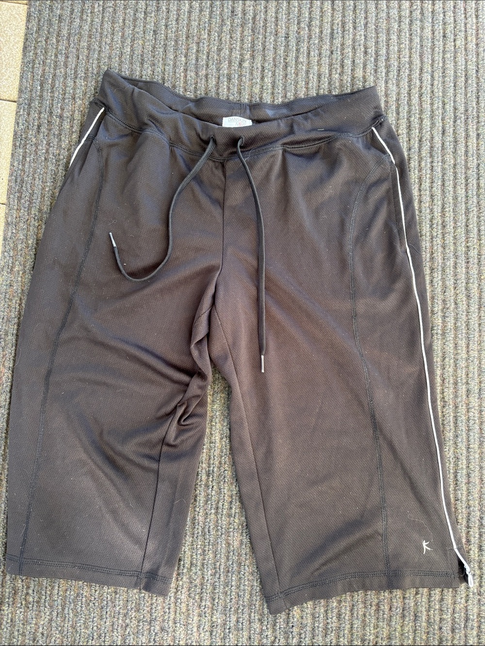 Danskin Now Black womans shorts with White Piping